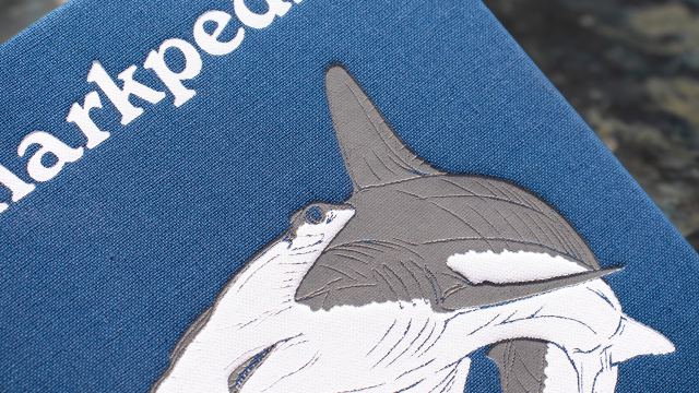 Sharkpedia front cover closeup detail.